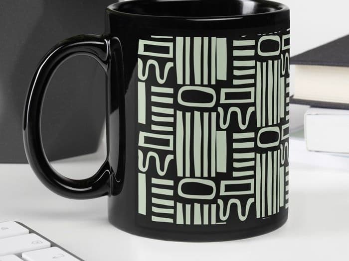 Personalized Star Map - Black Glossy Mug - 11 oz shown in a room